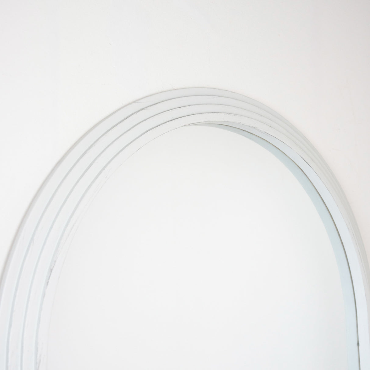 Large arched leaner mirror with white frame, 80cm x 180cm, modern minimalist design against neutral background