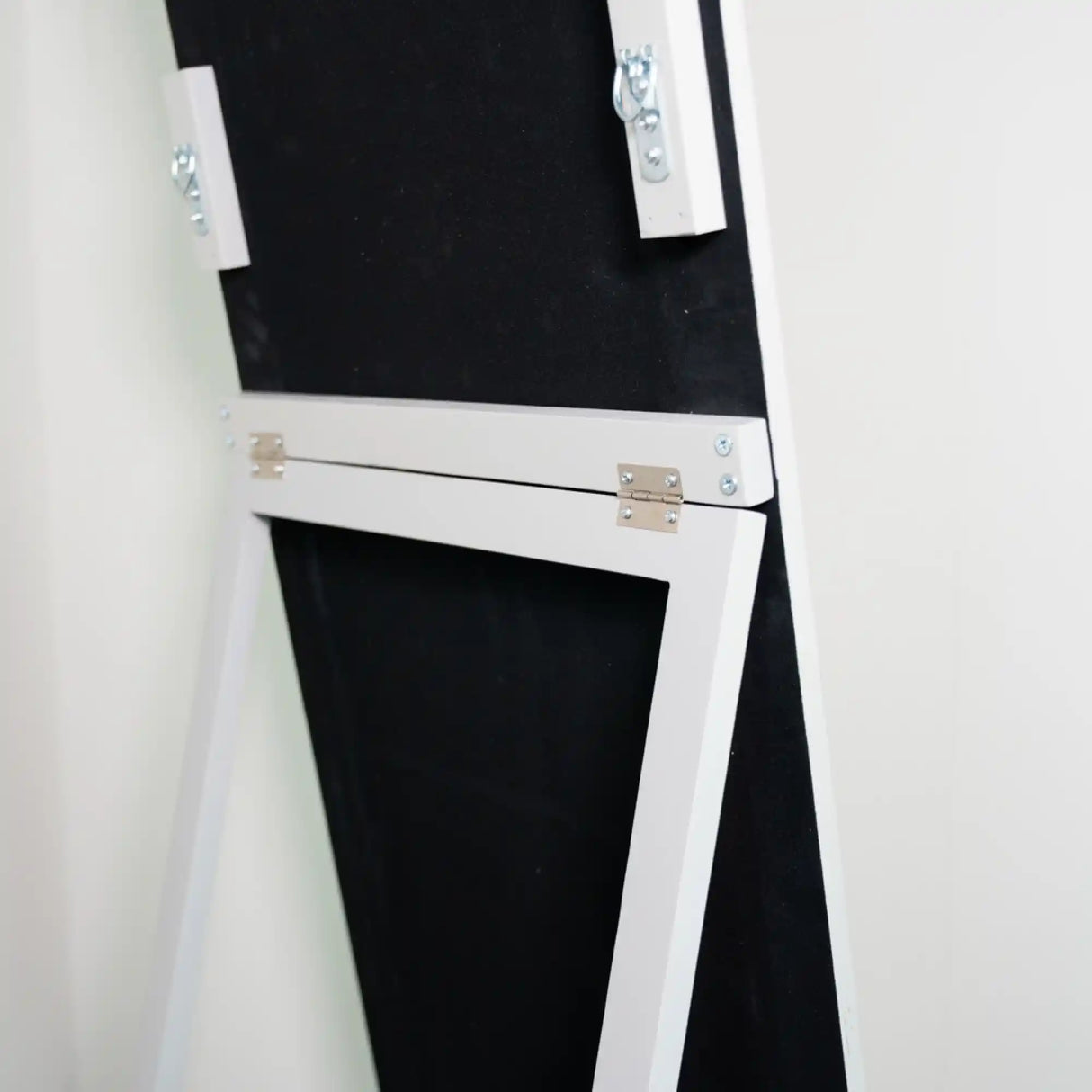 Tara Lane Stepped Arched Floorstanding Mirror in Oyster white with black interior panel, featuring brass hinges and decorative frame detail, 40cm x 170cm