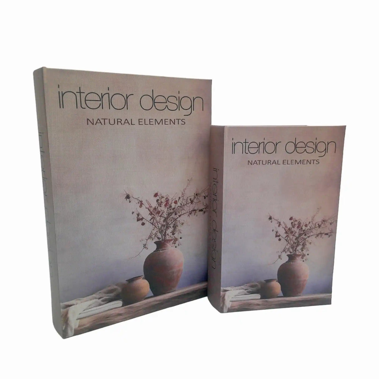 Two stacked decorative book boxes with muted mauve covers featuring dried flowers in terracotta vases and driftwood, titled Interior Design Natural Elements in modern typography