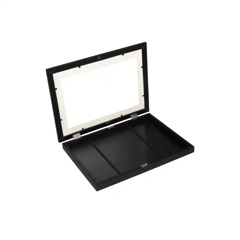 Black MDF display case with glass front and white interior mat, open to show three divided compartments for displaying artwork or collectibles