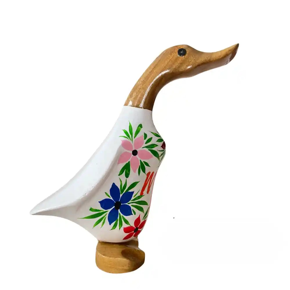 Wooden decorative duck figurine with carved head and curved neck, white ceramic body hand-painted with pink, blue, and red flowers and green leaves, natural wood base, folk art style home décor