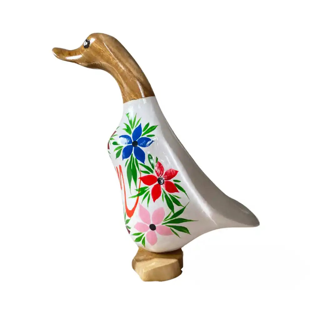 Wooden decorative duck figurine with golden brown carved head and base, white ceramic body hand-painted with colorful flowers in blue, red, and pink with green foliage details