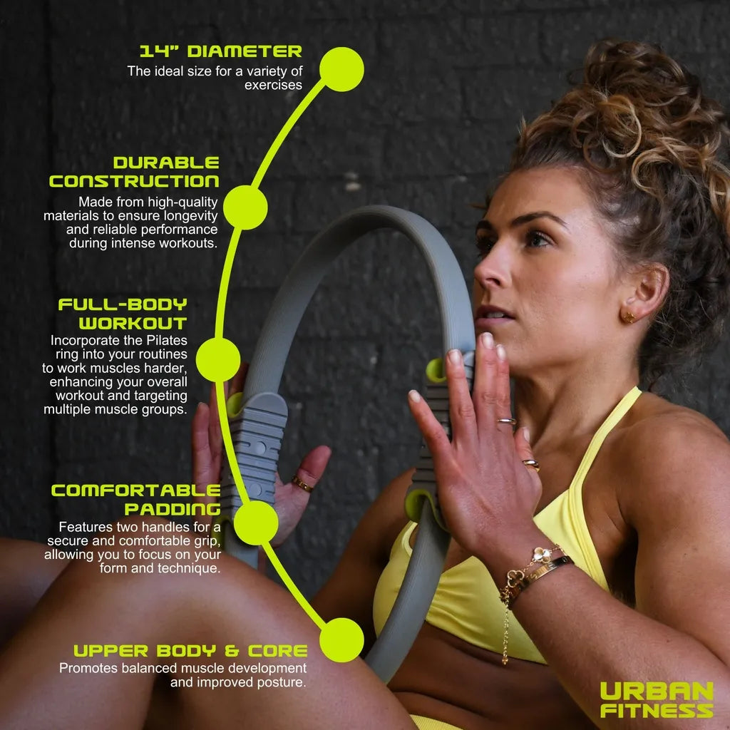 Woman in yellow sports top demonstrating Urban Fitness 14 inch Pilates ring with neon yellow and grey dual handles, showing product features including durable construction, comfortable padding, and full-body workout benefits for Pilates and fitness training