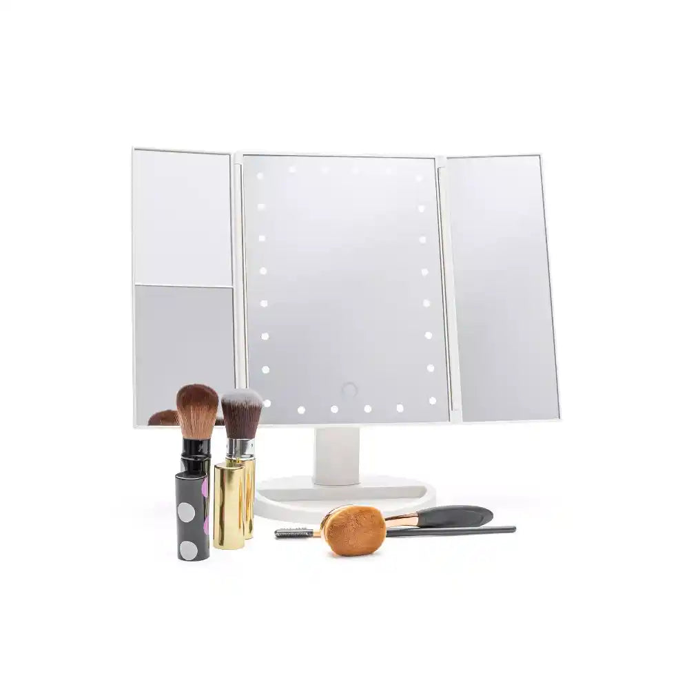 Rio 24 LED Touch Dimmable Cosmetic Vanity Folding Mirror in white with LED lights, displayed with makeup brushes, cosmetic tools and accessories on white surface