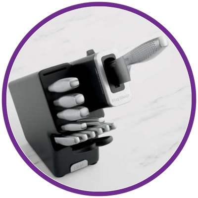 Knife sharpener with multiple stages on a white background