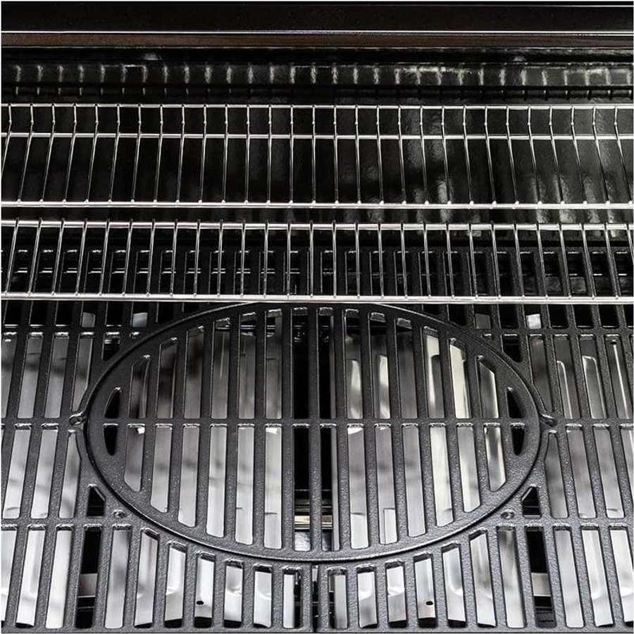 Close-up overhead view of Sahara X450-S black gas barbecue grill showing four burner grates and oval cooking surface with vertical steel grates and control knobs