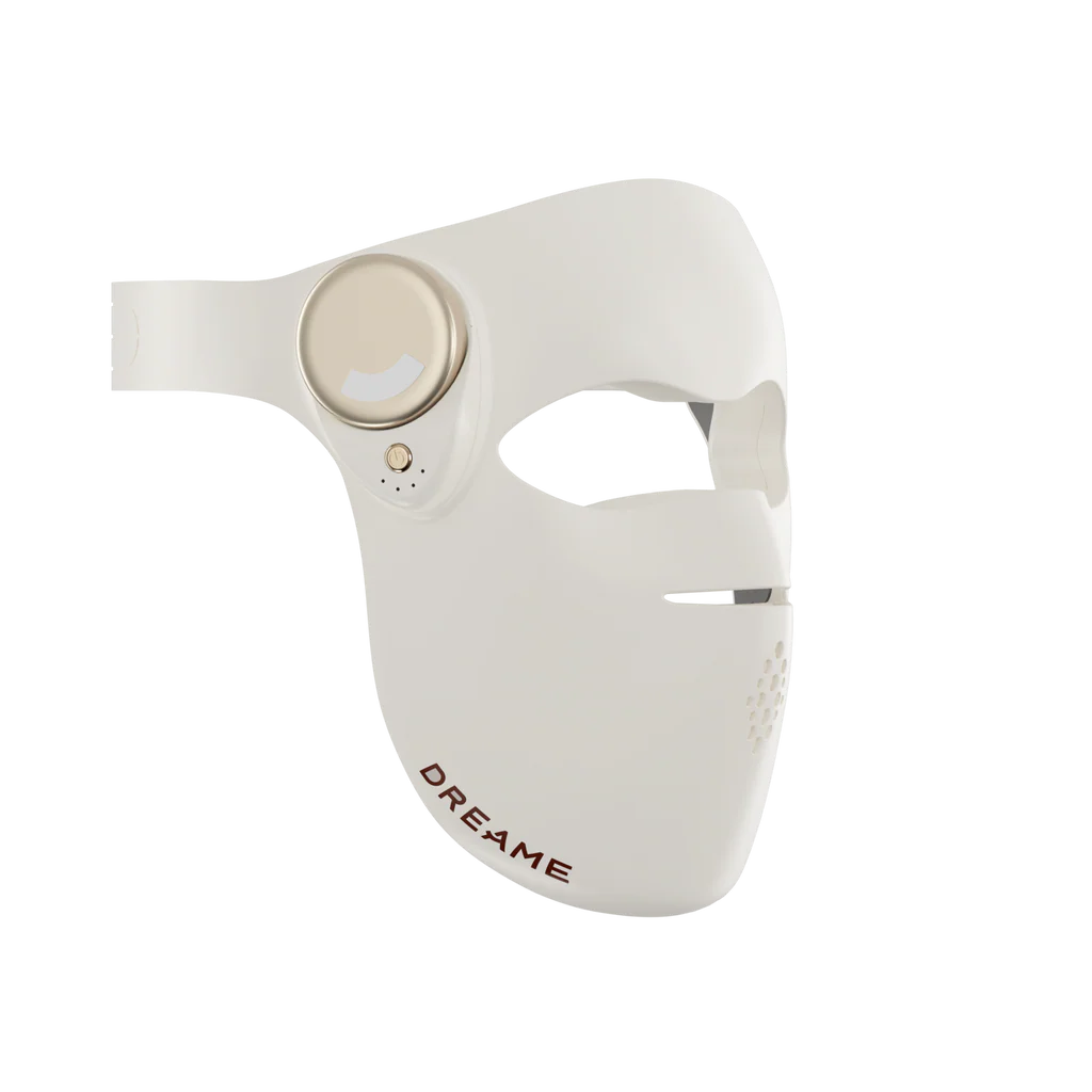 Dreame Chrona white LED face mask with circular light panel on forehead, open eye and mouth areas, featuring ventilation holes and brand name on chin area
