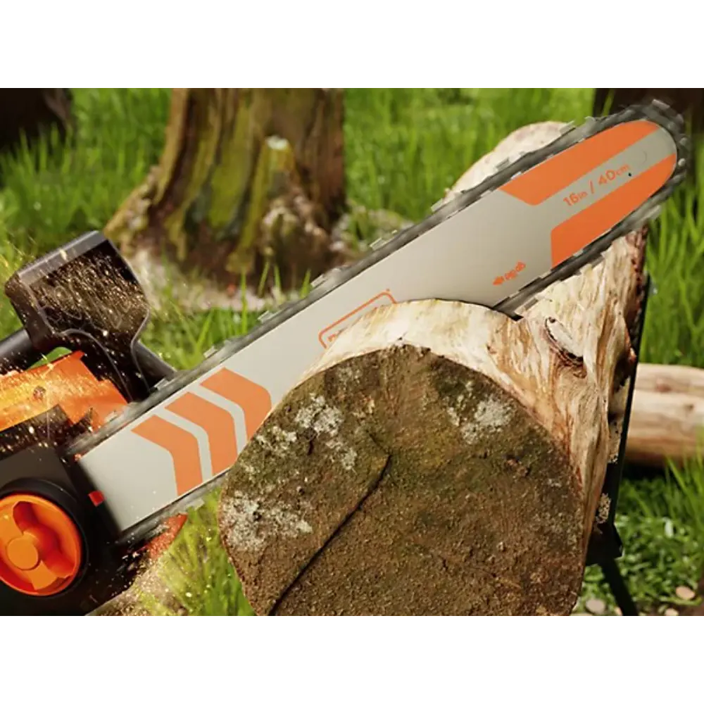Black & Decker BECS2040 electric chainsaw with orange and grey body cutting through a log, showing 40cm bar and chain in action on grass background