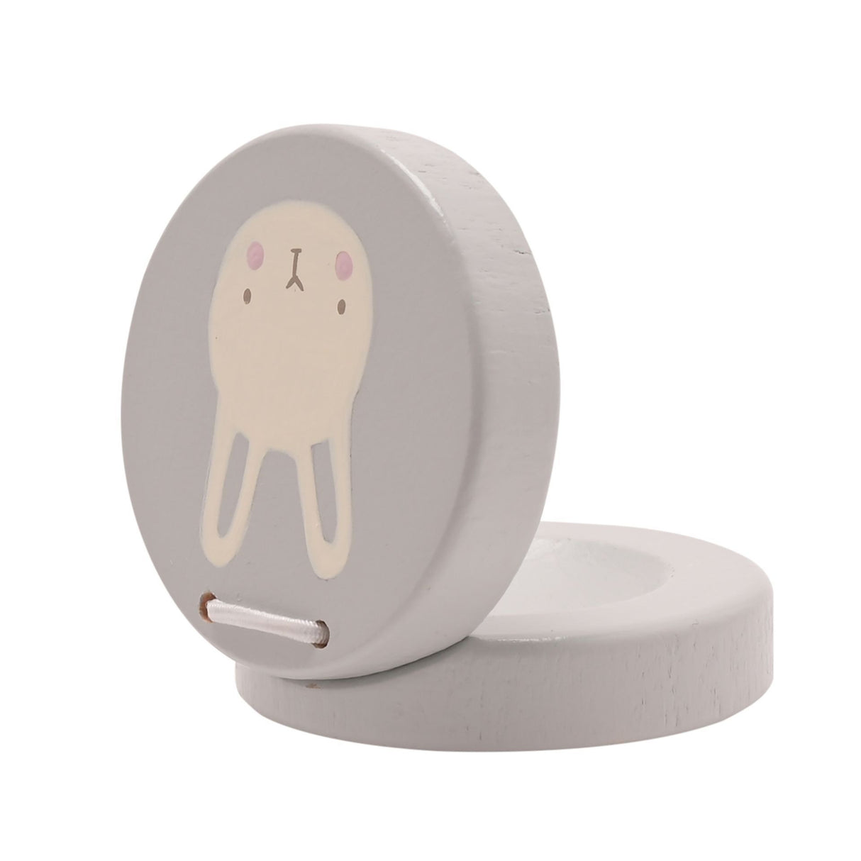 Bambino wooden music set featuring a grey oval-shaped drum with a cute cream character design and pink cheeks, displayed with a matching grey cylindrical base and wooden mallet