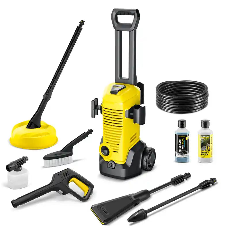 Kärcher K3 Eco!Booster yellow and black pressure washer with complete accessory kit including spray gun, hose, cleaning solutions, brush attachment, surface cleaner and extension lance displayed against white background