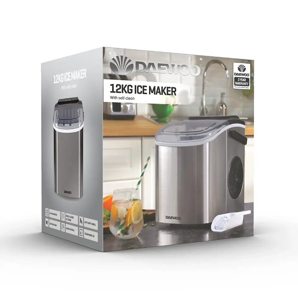 Daewoo 12KG ice maker with self-clean function in stainless steel finish displayed in product packaging, showing the compact countertop appliance with water tank and ice scoop, featuring 3-year warranty label
