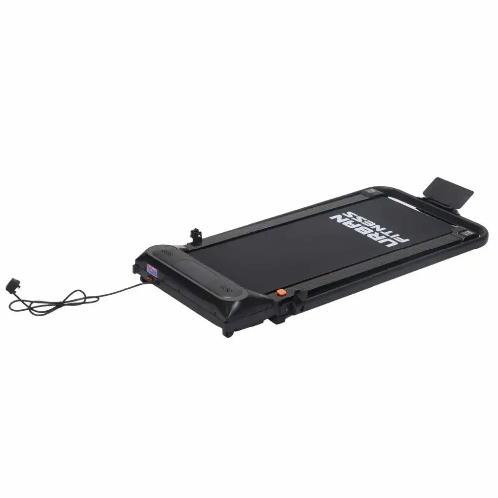 Black compact electric walking treadmill with digital display, handrails, and power cord, angled view on white background