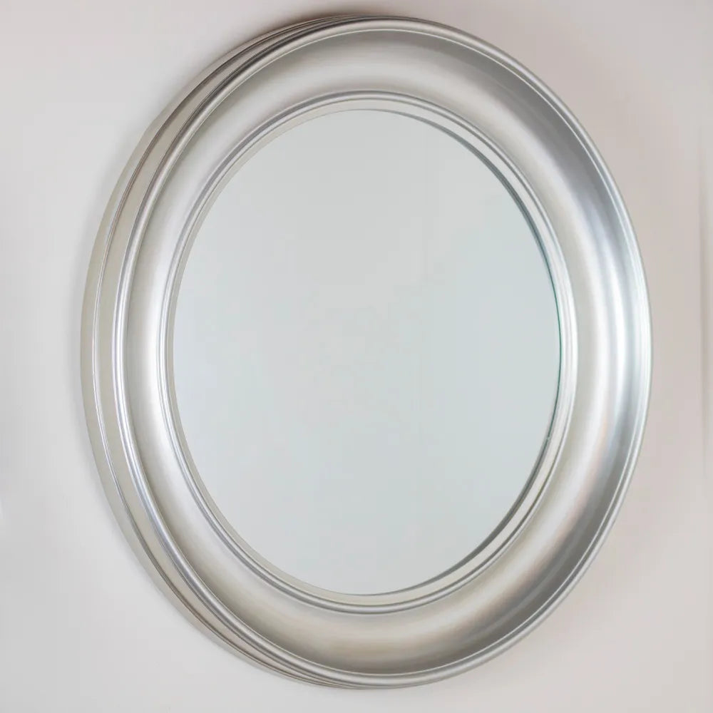 Tara Lane Lyla Round Mirror 90cm in Champagne with brushed metal frame and clear reflective glass mounted on white wall
