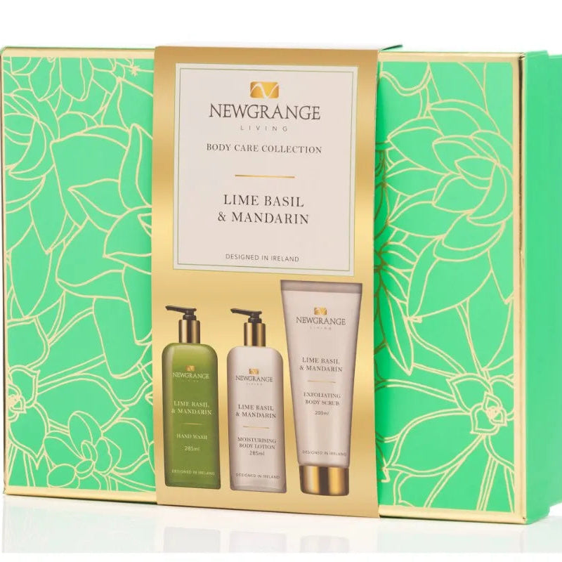 Newgrange Living Lime Basil and Mandarin body care collection luxury gift set featuring green and gold packaging with hand wash, body lotion, and exfoliating body scrub bottles displayed against coordinating patterned box designed in Ireland