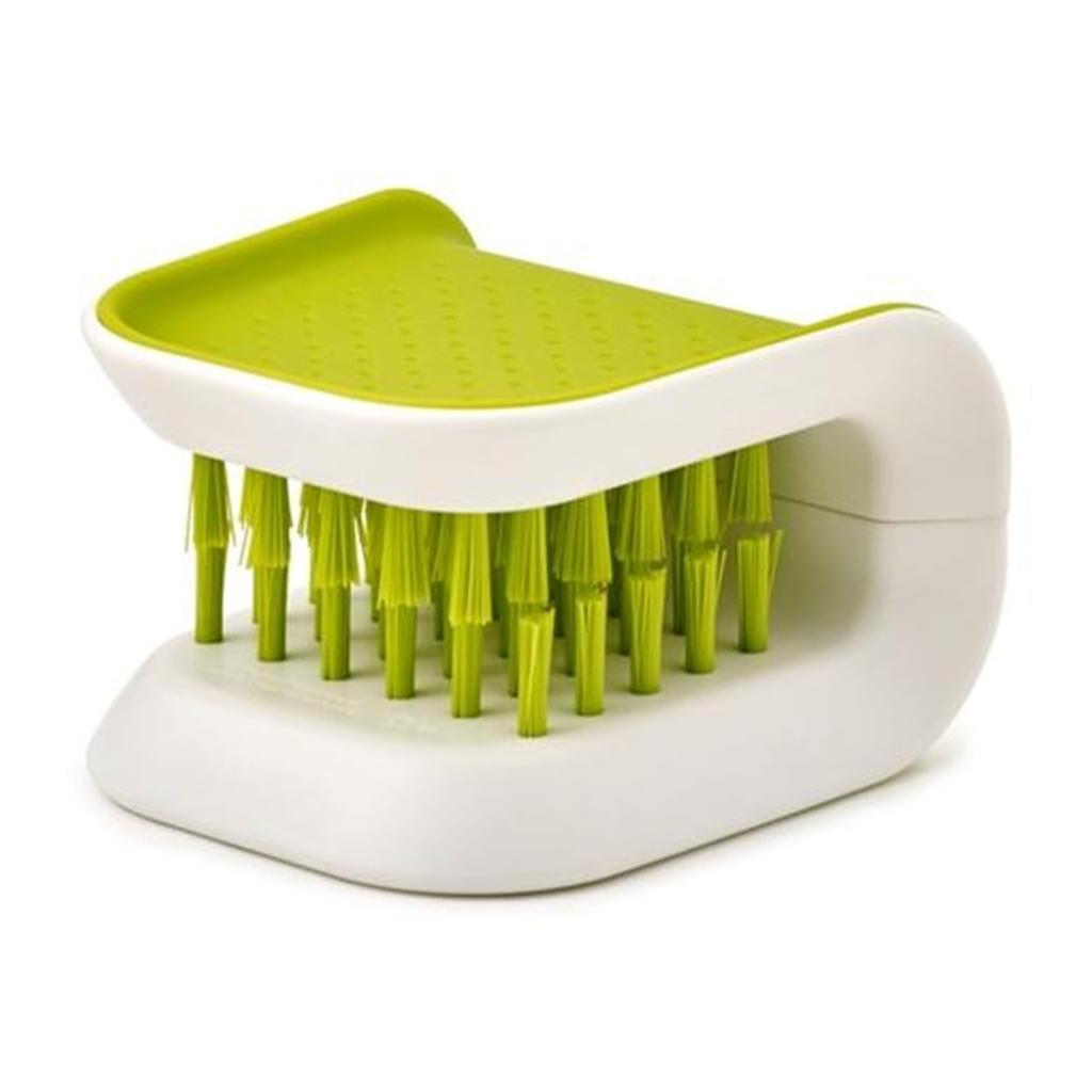 Joseph Joseph BladeBrush Knife Cleaner in green and white with soft bristles for cleaning knife blades