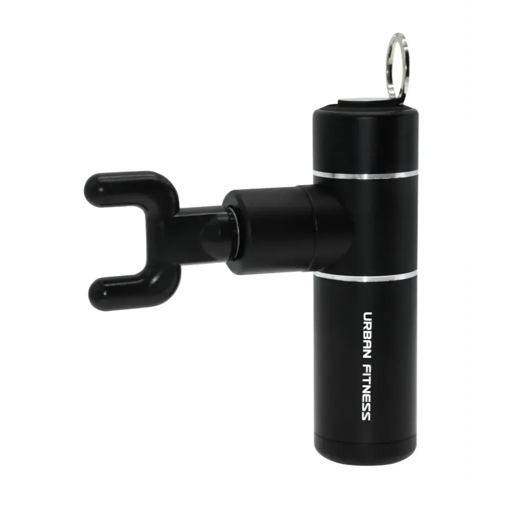 Black compact massage gun by Urban Fitness with metal attachment head, carrying handle loop, and white brand text on cylindrical body