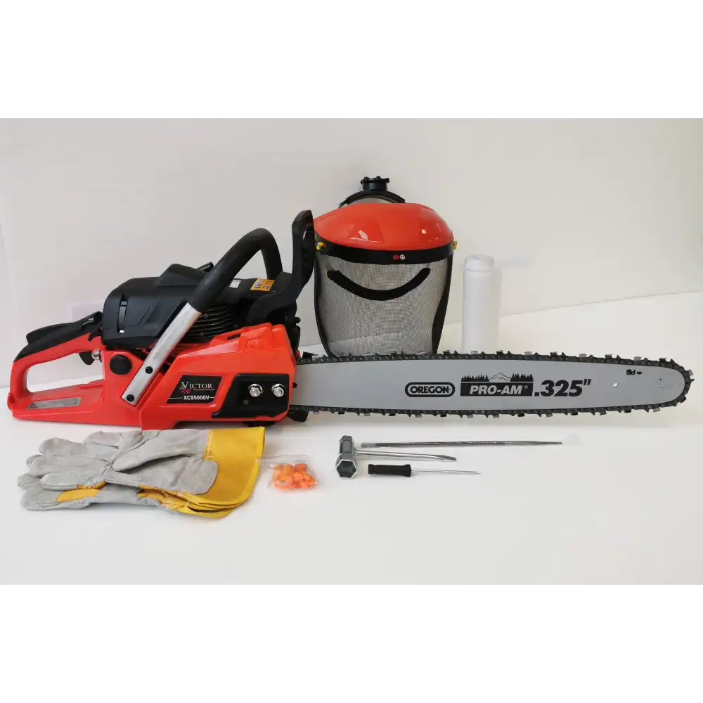 Victor XCS5000V 50cc chainsaw in red with 20 inch Oregon Pro-Am bar, includes protective gear, face shield, gloves, fuel container, and maintenance tools laid out on white background