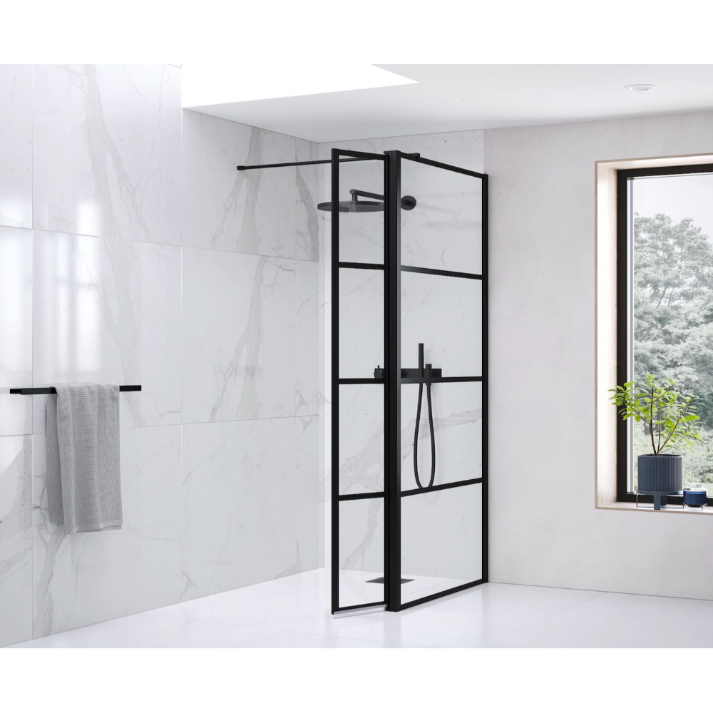 Modern matte black framed glass shower enclosure with grid pattern panels in a minimalist white marble bathroom with chrome fixtures and towel rail