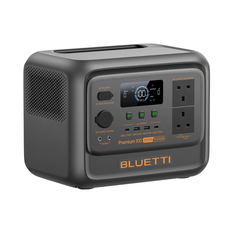 Bluetti Premium 100 V2 portable power station with 2000W output and 1024Wh capacity, featuring dark gray and black casing with orange accents, digital display screen showing 100W output, multiple AC outlets and USB ports, front control panel with buttons and dial, and perforated ventilation grille on left side