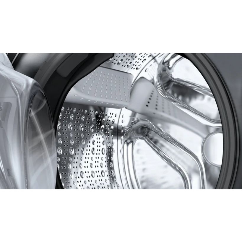 Close-up interior view of Bosch Series 6 washing machine drum showing stainless steel perforated drum with water droplets and silver metal components against graphite gray exterior casing