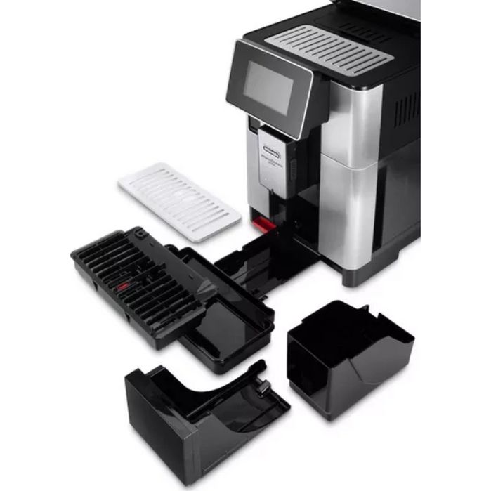 DeLonghi PrimaDonna Soul automatic coffee machine in metal black showing disassembled components including water tank, drip tray, grounds container and removable parts on white background