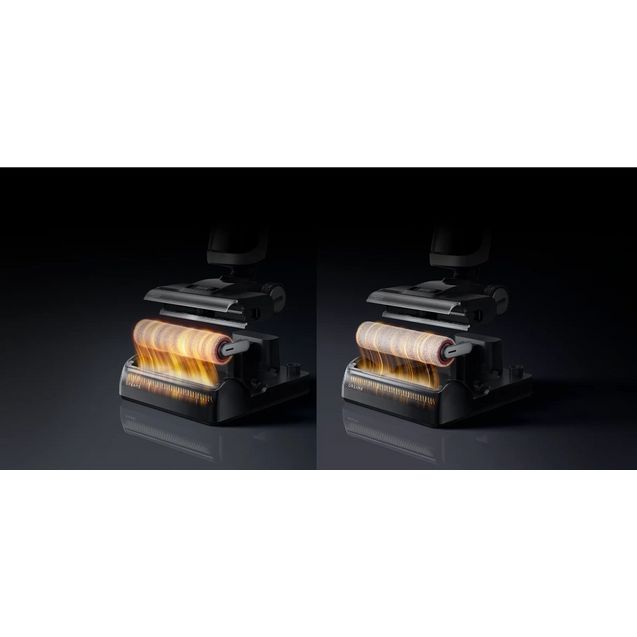 Dreame H14 Pro wet and dry vacuum cleaner showing dual rotating brush heads with gold and silver bristles illuminated against black background, demonstrating cleaning roller mechanism from front view