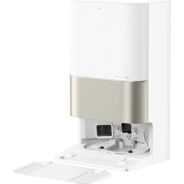 Dreame X50 Ultra white robot vacuum cleaner with silver brushed metal accent band, shown with docking station and white cleaning pads displayed in front