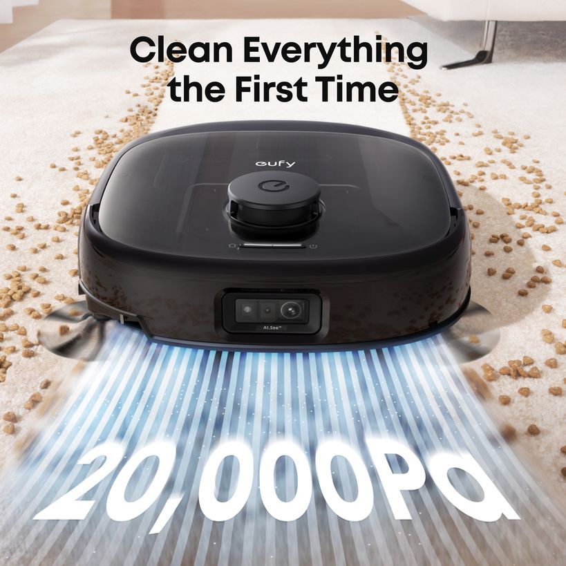 Black eufy Omni E25 with 20,000 Pa suction picking up crumbs from carpet