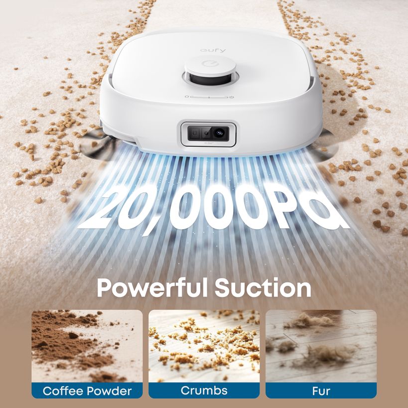 White eufy Omni E25 with 20,000 Pa suction on coffee powder, crumbs and fur