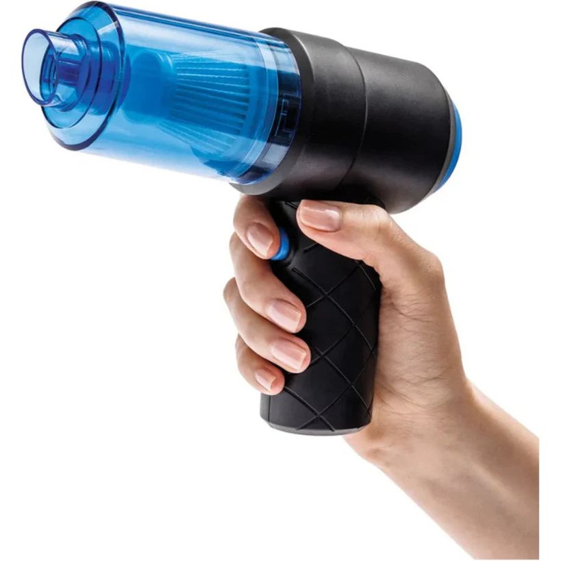 Hand holding JML Go Vac portable handheld vacuum cleaner with black grip handle and translucent blue collection chamber against white background