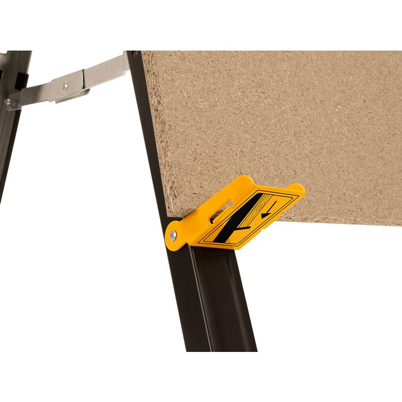 Yellow and black folding sawhorse with cork work surface attached to dark metal frame, shown against white background