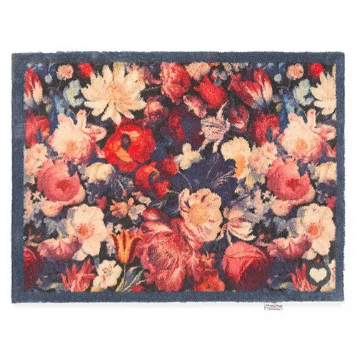 Hug Rug floral runner mat 65cm x 150cm featuring vibrant red, pink, cream and yellow flowers on dark navy blue background with natural jute backing