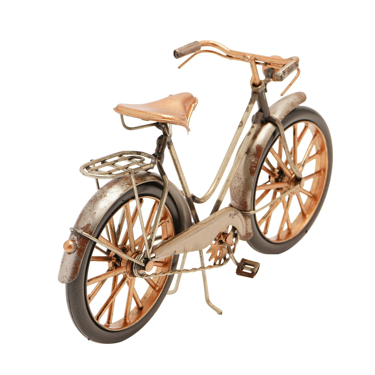 Vintage-style decorative bicycle ornament with distressed cream and copper metal frame, tan leather saddle, woven front basket, spoke wheels with rust-colored rims, and curved handlebars, Harvey Makin collectible home décor piece