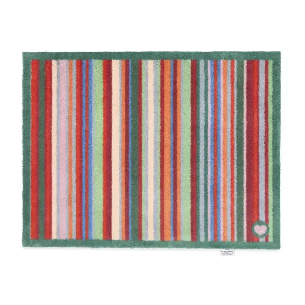 Hug Rug doormat with vertical multicolored stripes in red, pink, blue, orange, yellow and cream on a sage green border, 65cm x 85cm
