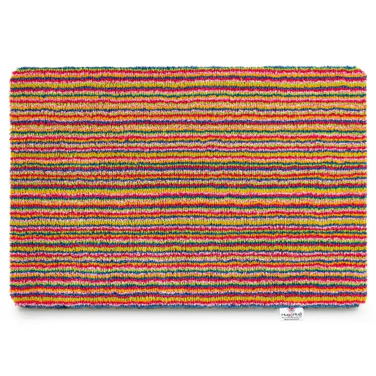 Hug Rug Candy Stripe Bright doormat 50cm x 75cm featuring multicoloured horizontal stripes in red, yellow, green and blue with textured coir surface and brand label visible in corner