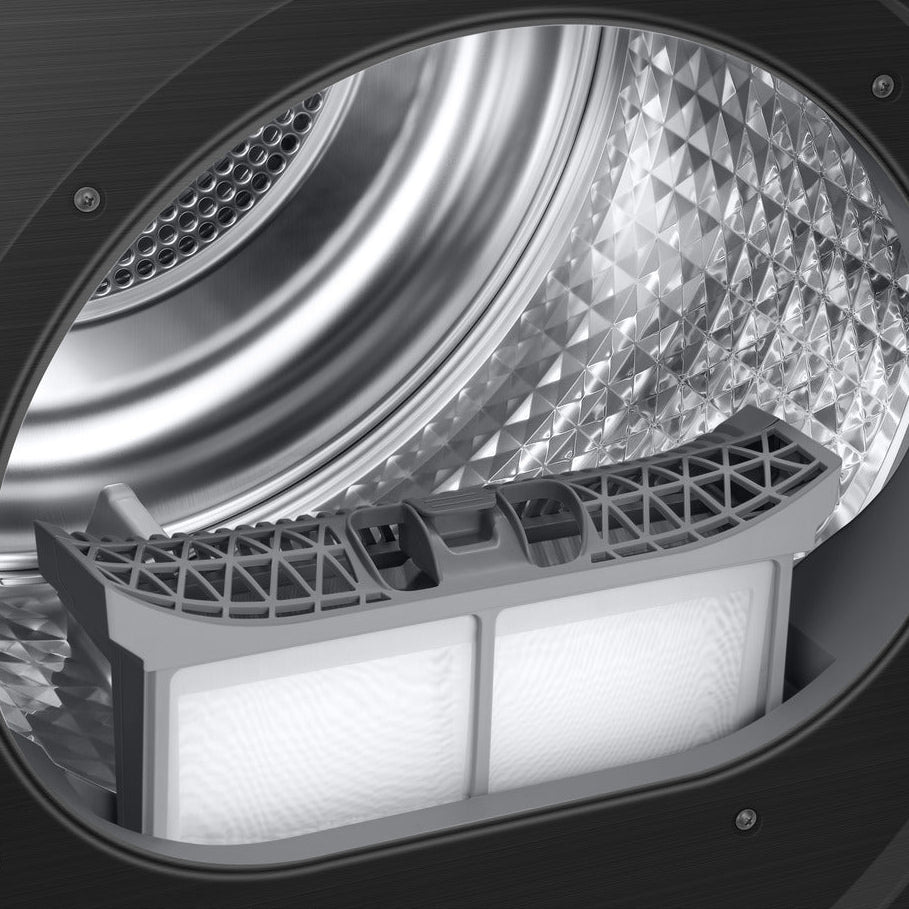 Interior view of Samsung Series 6 AI Energy heat pump tumble dryer showing stainless steel drum with diamond pattern, white lint filter, gray mesh ventilation grate and black exterior housing