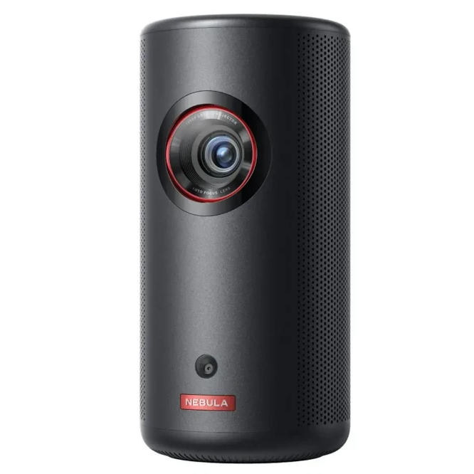 Nebula Capsule 3 black portable laser projector with red-rimmed camera lens and textured surface, cylindrical design on white background