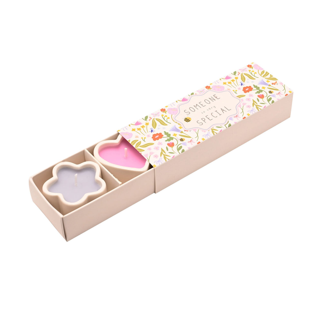 Set of three mini scented candles in decorative shaped holders (heart and flower designs) in pink and lavender colors, displayed in a cream cardboard gift box with colorful floral patterned sleeve labeled "Someone Special"