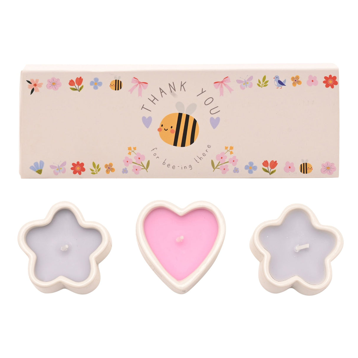 Set of three decorative mini candles in flower and heart shapes with cream-colored wax containers, featuring pink heart-shaped candle in center and lavender flower-shaped candles on sides, accompanied by beige gift box decorated with colorful illustrated bee and floral motifs and Thank You message