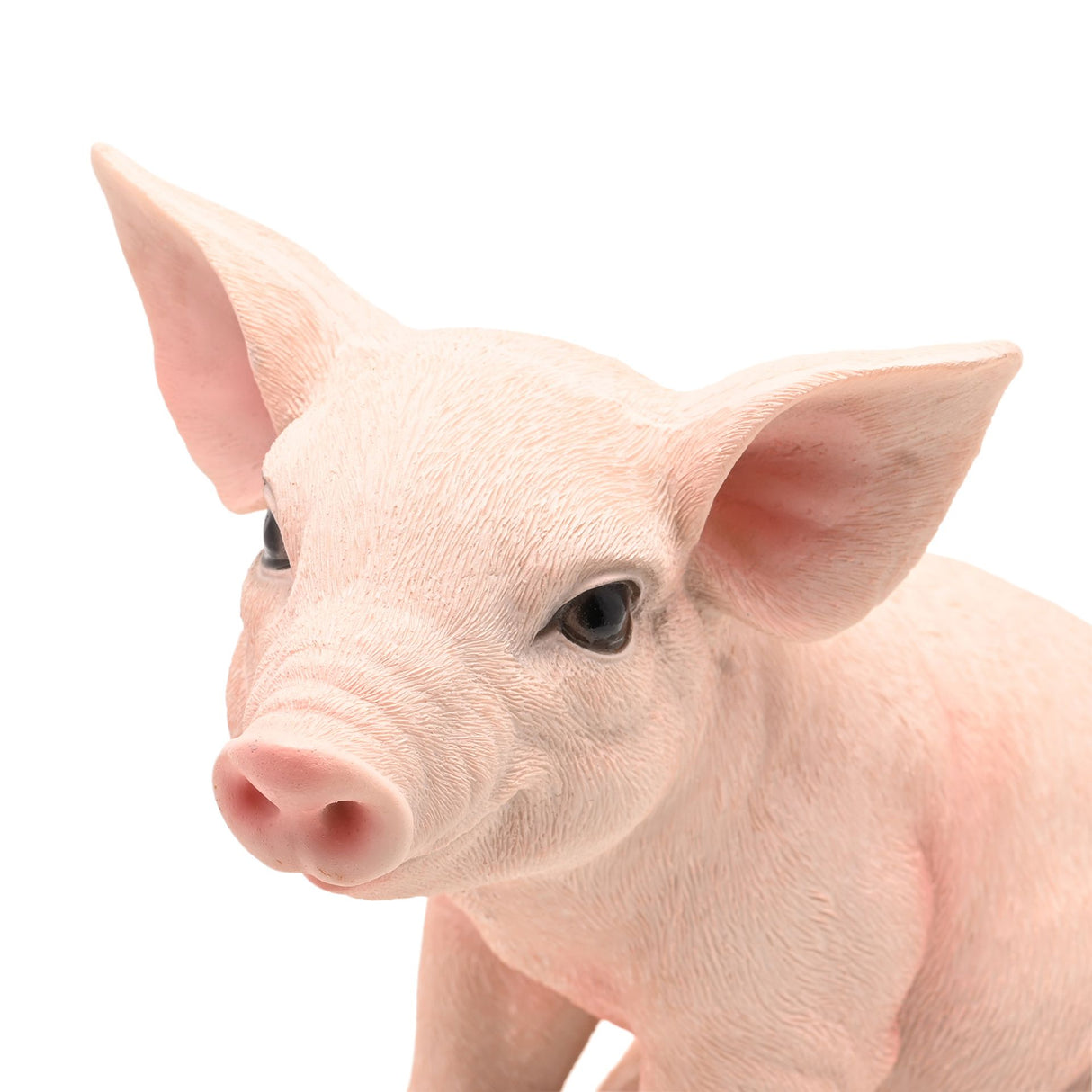 Naturecraft ceramic sitting pig figurine in pale pink with detailed facial features and textured fur, 23.5cm tall, isolated on white background