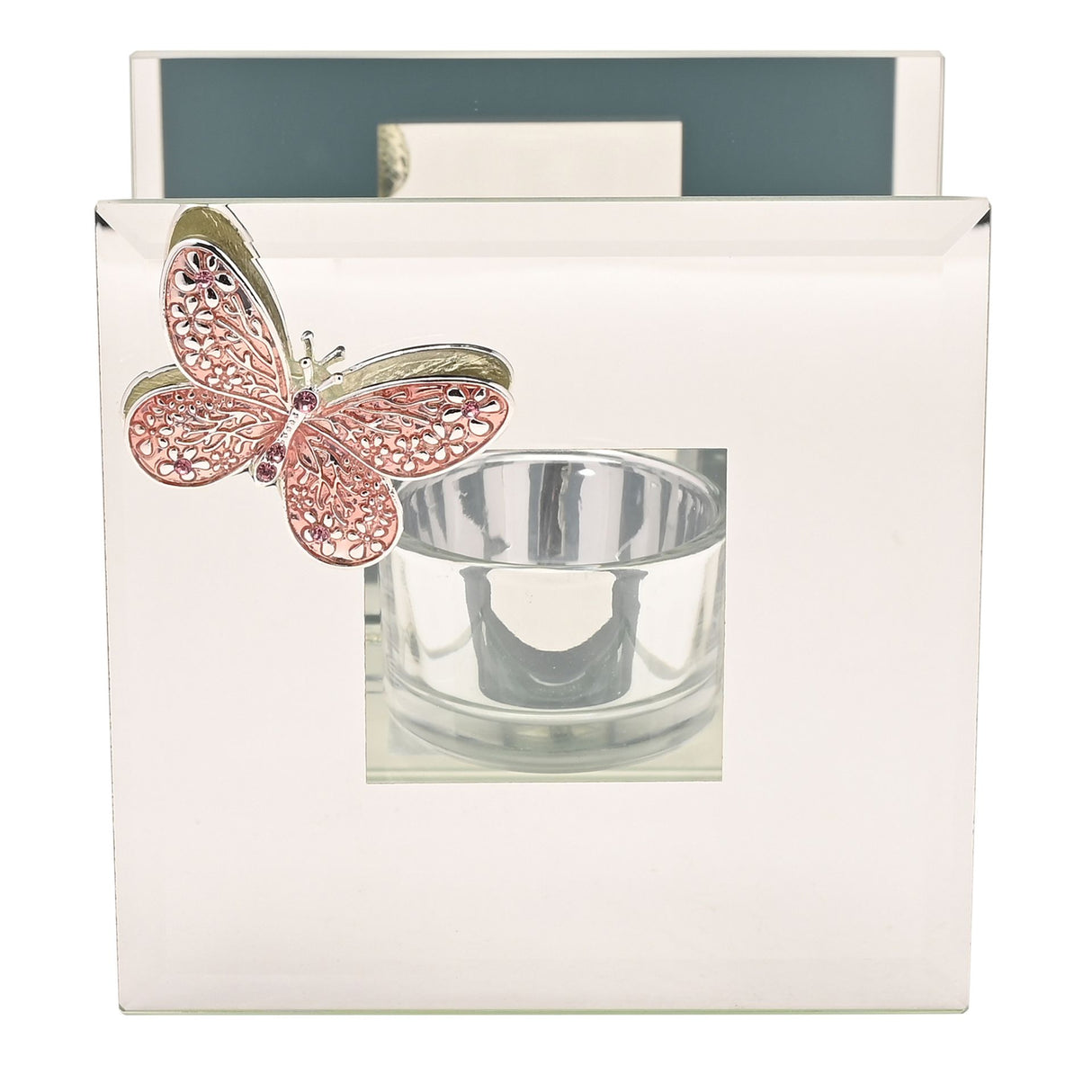 Pink and gold filigree butterfly perched above clear glass tea light holder with silver rim in white gift box packaging