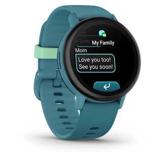 Teal smartwatch with a message displayed on the screen against a white background