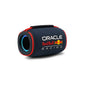 Oracle Red Bull Racing portable Bluetooth speaker with black mesh fabric body, red trim accents, blue illuminated speaker grille, and official team branding on dark background