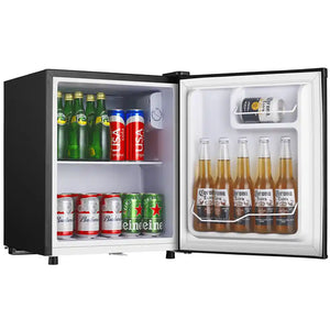 Black tabletop beverage cooler with glass door open displaying shelves stocked with green beer bottles, red and white cans, and Corona beer bottles on the right side door shelf