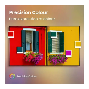 Precision Colour marketing image showing vibrant red and yellow building facades with colorful windows, green shutters, and magenta flowers demonstrating color accuracy and vivid display quality