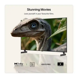 LG B6 55 inch OLED TV displaying a close-up image of a dinosaur head with blue eye on screen, featuring Dolby Vision Atmos, Eye Safe, and HDR 10 Pro technology badges below the display against a beige background with tagline Stunning Movies
