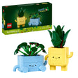 LEGO Happy Plants 10349 set showing two buildable potted plant characters - a yellow cactus planter with green leaves and a blue plant pot with green foliage, displayed alongside original packaging box featuring Happy Plants branding, 217 pieces, ages 9+