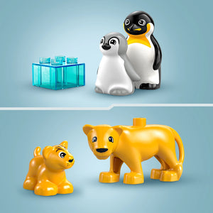 LEGO Wild Animal Families set 10442 featuring colorful plastic penguin figures in black and white with yellow accents, a gray and white chick penguin, yellow lion family figures including adult and cub, and a translucent turquoise building block element against a light blue background