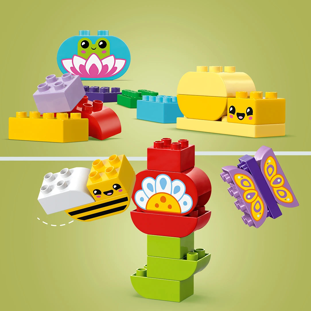 LEGO Creative Garden and Flowers set 10444 featuring colorful brick-built garden characters including a smiling frog on a lily pad, a yellow bee, a red flower with yellow center, purple butterfly, and various pastel-colored LEGO bricks in yellow, red, purple, green and blue arranged on a pale green background