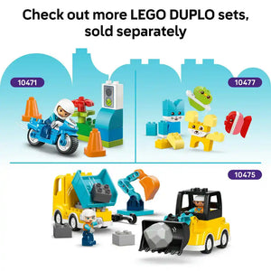 LEGO DUPLO Fire Truck set 10473 featuring a red and yellow fire engine with ladder, firefighter minifigure, orange traffic cones, and green building blocks on blue background